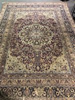 Lot 450 - Tabriz pattern carpet, central medallion on a...