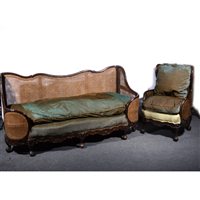 Lot 389 - Three-piece walnut framed bergere suite, double cane panels