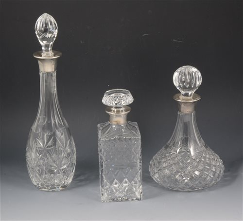 Lot 35 - Three silver-mounted contemporary glass decanters