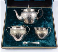 Lot 254 - Silver plated three piece teaset