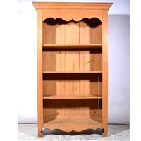 Lot 444 - A modern pine full height open bookcase.