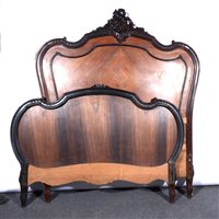 Lot 411 - French walnut and rosewood bedstead