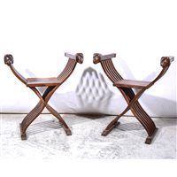 Lot 467 - Pair of stained beechwood folding Savonarola chairs