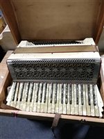 Lot 147 - Italian accordion, in a pine case.