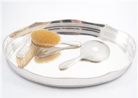 Lot 300 - Silver backed three piece dressing table set, Walker & Hall, Sheffield 1929 and 1930; oval electroplated tray (4).