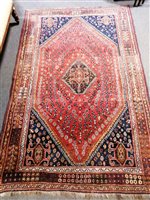 Lot 442 - Persian carpet with central diamond medallion