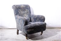 Lot 390 - An Edwardian deep easy chair.