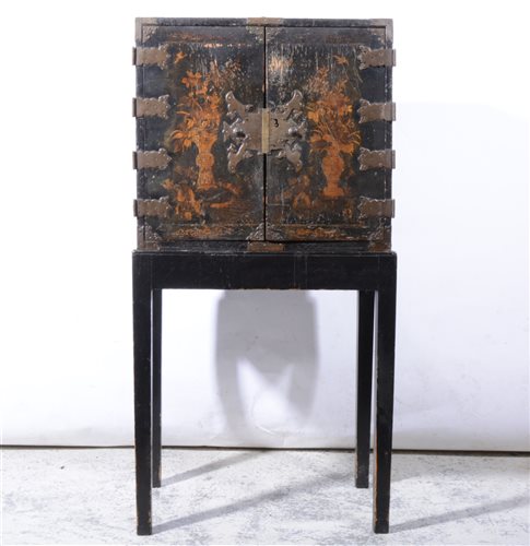 Lot 319 - Black lacquered chinoiserie decorated cabinet, on later stand.