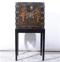 Lot 319 - Black lacquered chinoiserie decorated cabinet, on later stand.