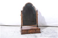 Lot 402 - A George I style figured walnut toilet mirror.