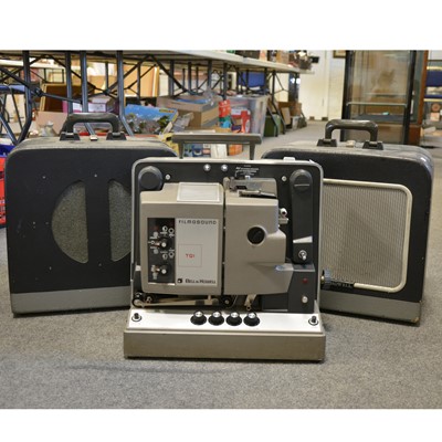 Lot 296 - Bell & Howell Filmosound TQI 16mm projector, with a pair of Bell & Howell speakers in carry cases.