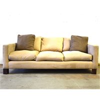 Lot 459 - A contemporary three-seater sofa