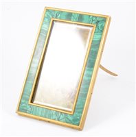 Lot 190 - A malachite strut photograph frame, the border 18mm wide, brass framed with the solid back dated 26th October 1886