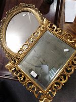 Lot 451 - Florentine style gilt wood mirror and oval composition mirror.