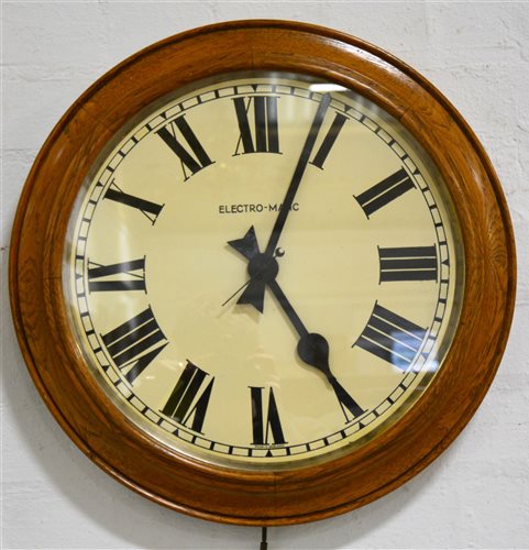 Lot 382 - Electro-matic wall clock, oak cased, 38cm dial, 50cm case