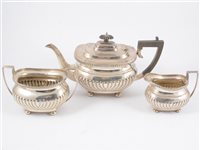 Lot 264 - A silver half fluted three piece teaset by James Deacon & Sons, Sheffield 11921