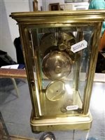 Lot 193 - Brass four glass mantel clock, ...