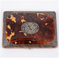 Lot 230 - A tortoiseshell card case with white metal mounts and lined interior.