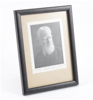 Lot 193 - George Bernard Shaw, a postcard size photograph with faint autograph signature and indistinct dedication, 12x9cm, framed and glazed.