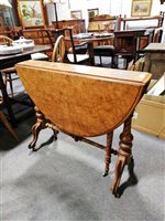 Lot 373 - A Victorian walnut Sutherland table