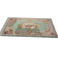 Lot 481 - Chinese rug, floral field against a green ground