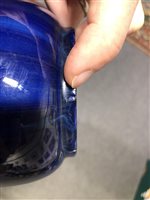 Lot 38 - Pilkingtons Royal Lancastrian blue glaze bottle vase, number 2940, 26cm.