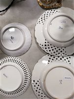 Lot 49 - A set of four Meissen plates