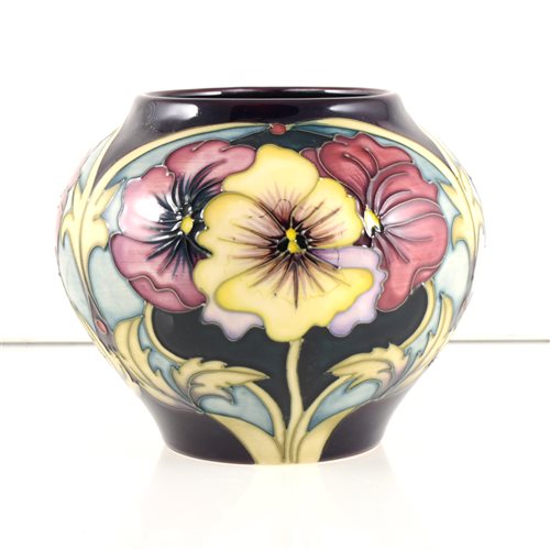 Lot 549 - A Moorcroft Pottery vase, 'Pansy' designed by Rachel Bishop.