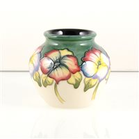 Lot 565 - A Moorcroft Pottery vase, ‘Paradise with Pansies’ designed by Kerry Goodwin.