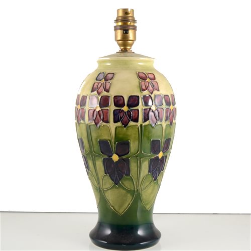 Lot 540 - A Moorcroft Pottery lamp base, 'Violet' designed by Sally Tuffin.