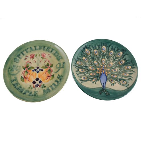 Lot 546 - Two Moorcroft Pottery year plates, ‘Peacock’ 1994; and ‘Spitalfields Temple Mills’ 1991