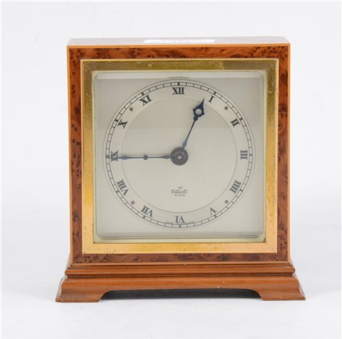 Lot 194 - An Elliott mantel clock with square dial and Roman numeral chapter ring in a square birds eye case 14cm high