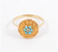 Lot 271 - A floral design turquoise dress ring with six small turquoise and a small diamond to centre, shank marked 18ct, gross weight approximately 3gms, ring size O.
