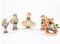Lot 24 - A collection of sixteen Goebel Hummell figures, to include Apple Tree Boy and Girl, Meditation, For Father and Home From Market, (16).