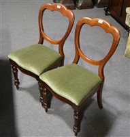 Lot 380 - A set of four Victorian mahogany balloon back dining chairs