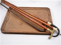 Lot 161 - Walking cane with ivory pommel; pair of walking sticks; oak tray; carved oak frames;  coffer-shape musical box; alabaster table lamp; and household linen.