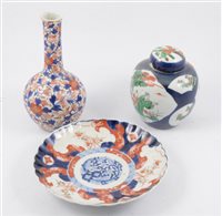 Lot 74 - Chinese polychrome ginger jar; an Imari bottle vase; two Imari plates; and an Isnik style plate.