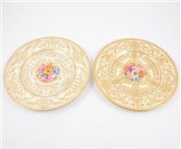 Lot 19 - A pair of 20th Century Royal Worcester plates painted by J Freeman. (2)