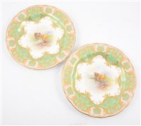 Lot 75 - Two Royal Worcester cabinet plates decorated by E. Townsend.