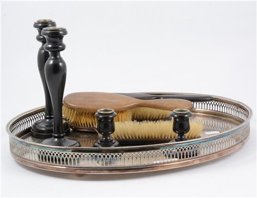 Lot 95 - Silver plated galleried tray with two pairs of ebony candlesticks and a brush set