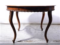 Lot 398 - A mahogany centre table with fancy pie-crust moulded edging.