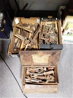 Lot 219 - Three boxes of old toys - saws, old brass tap, melting pot, small tools etc
