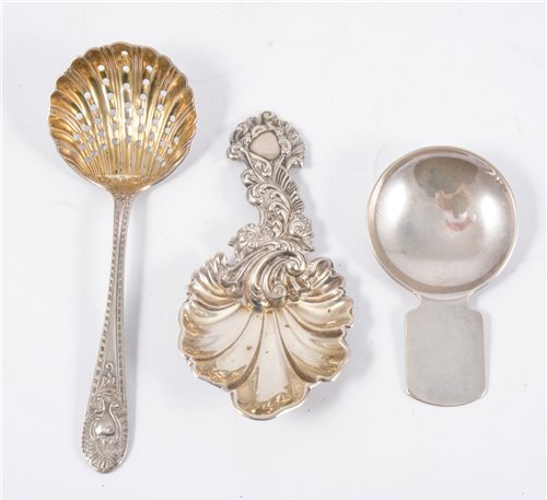 Lot 230 - A Victorian silver caddy spoon, another with pierced bowl, and later caddy spoon.