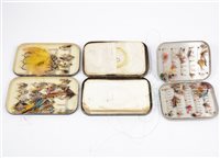 Lot 179 - Three vintage fishing fly tins containing early flies