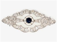 Lot 179 - A sapphire and diamond lozenge shaped brooch