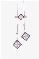 Lot 184 - An Art Deco style sapphire and diamond negligee pendant