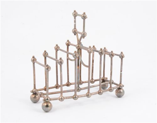 Lot 181 - An Elkington & Co silver plated toast rack, in the manner of Dr Christopher Dresser.