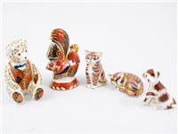 Lot 1 - A collection of Royal Crown Derby paperweights and similar figures
