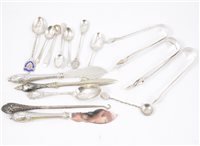 Lot 245 - Three silver sugar tongs by Henry John Lias, London 1877, Elizabeth and John Eaton, London 1858 and Edinburgh 1822 and and other silver flatware and silver handled pieces.