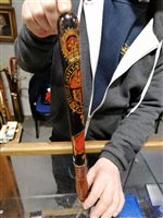 Lot 180 - A Warwickshire Constabulary decorated truncheon, painted in red and gold, with ribbed grip, 44cm, and another plain truncheon, 44cm with similar grip. (2)
